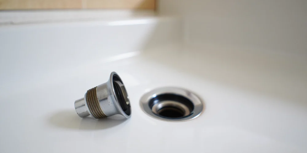 devisser-bonde-lavabo-bloquee